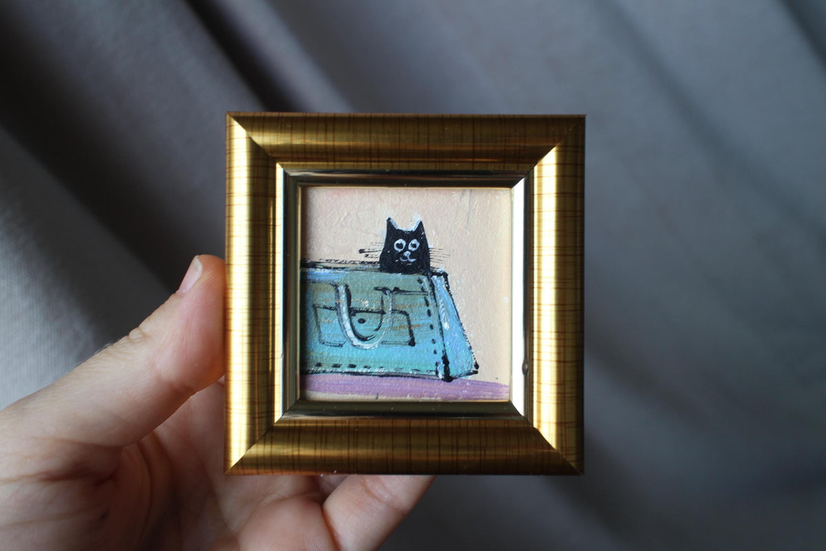 Shop our collection of original miniature cat oil paintings. Hand-painted 5x5 cm art with genuine gold leaf. The perfect unique gift for cat lovers and art collectors.