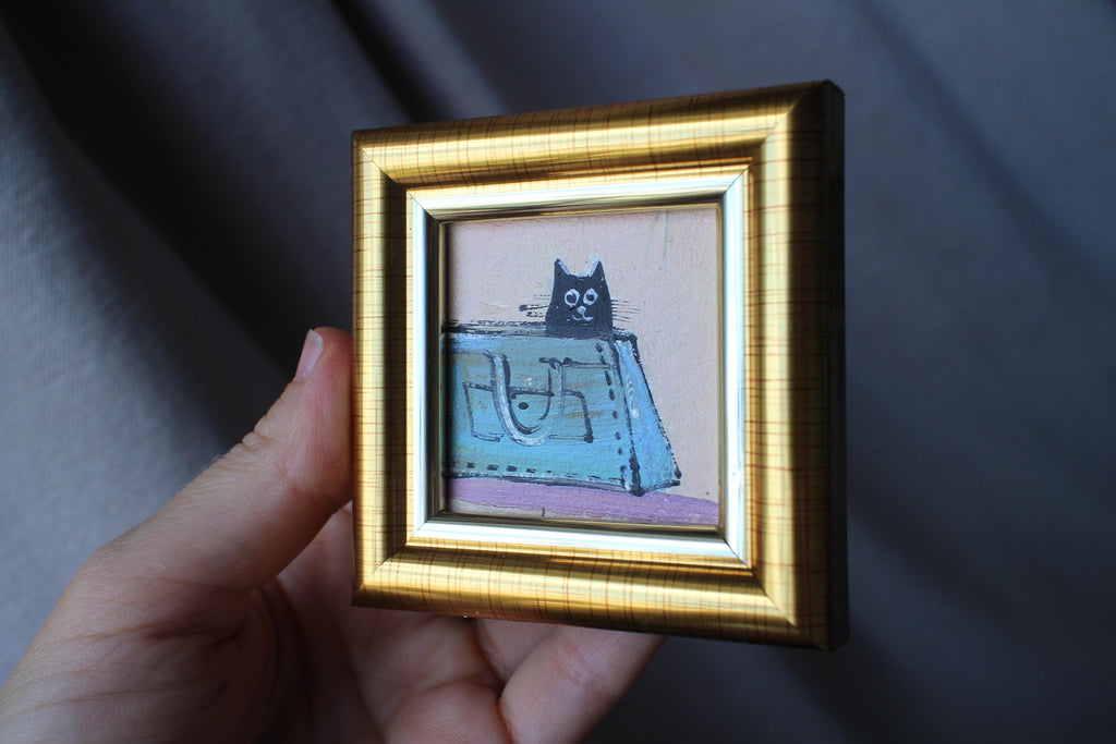 Miniature Black Cat sitting a woman's blue bag Oil Painting (2x2 in)
