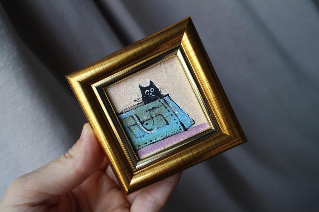 Miniature Black Cat sitting a woman's blue bag Oil Painting (2x2 in)